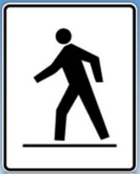 Pedestrian symbol of a walking figure on a white rectangular sign with a thin black border.
