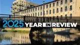 A stone building next to a river with overlaid text reading 2025 Year in Review