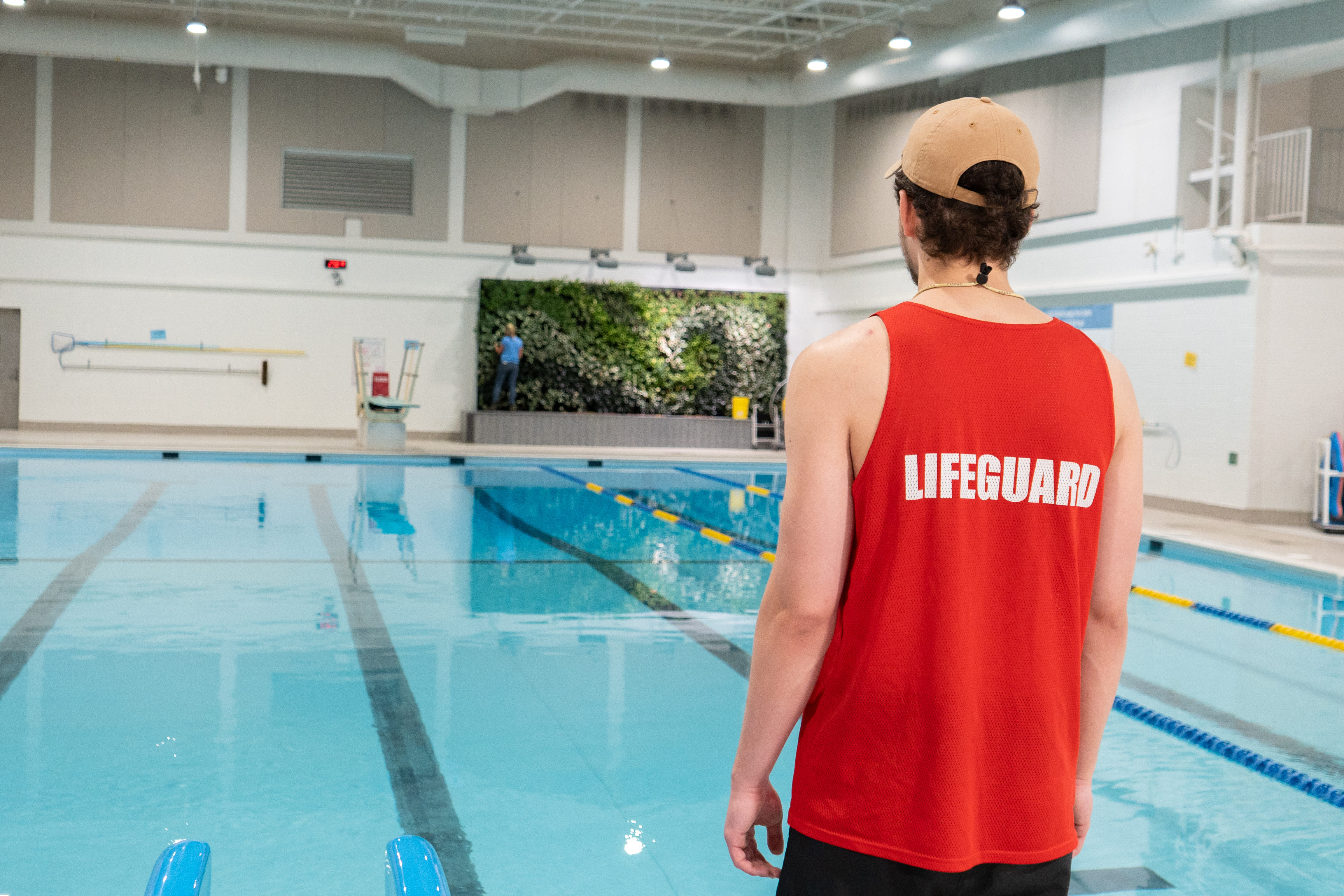 Lifeguard looking out over pool.
