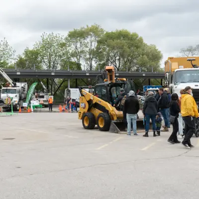 Cambridge public works yard with excavator and trucks